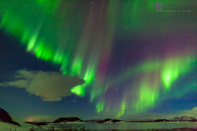 Rainbow Aurora over volcanic field